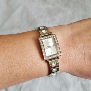 Silver and diamond Guess watch.